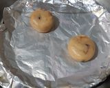 A picture of step 3 of Nutella peanut butter chocolate chips cookies.