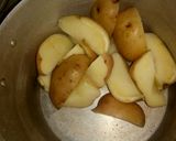 A picture of step 2 of Simple Rosemary potato wedges aaà.