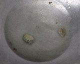 A picture of step 2 of Mushroom paneer masala.