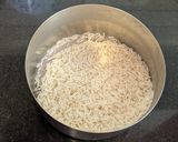 A picture of step 4 of Coconut milk rice.