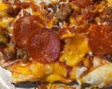 A picture of step 3 of Funtime Pizza with the Grandkids.