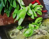 Foto langkah ke 6 dari resep Kepala Kerapu Kuah Kuning.