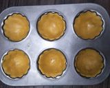 A picture of step 10 of Mango Rabri in mango tart shell.