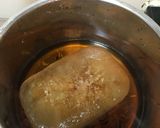 A picture of step 1 of Beef porridge with lotus seed and chickpea.