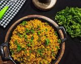 A picture of step 7 of Maharashtrian Phodnicha Masala Bhat.