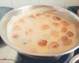 A picture of step 4 of Tasty masaledar Kadhi pakoda with phulka roti for Gujarati dinner.