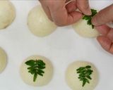 A picture of step 13 of Wagashi "Komugi-Manju" with a Fresh Herb.