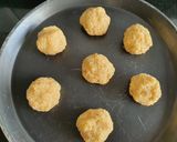 A picture of step 13 of Bolinhas Di Coco.