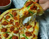A picture of step 11 of Chicken Tikka Pizza.