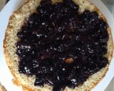 A picture of step 6 of Sponge cake filled with chunky blue berry jam.
