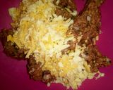A picture of step 2 of Cheesy meatballs in sauce.