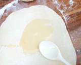 A picture of step 6 of Garlic Soft Layered Chapati.