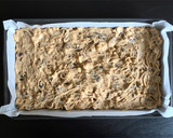 A picture of step 4 of Date & Macadamia Nut Slice.