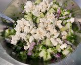 A picture of step 13 of Composed Salad with Black Tomatoes, Cucumber, Red Onion, Feta, and Parsley.