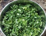 A picture of step 1 of Methi bhaji green garlic pakora.