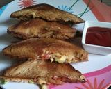 A picture of step 8 of # Tiffin box # Cheese sandwich.