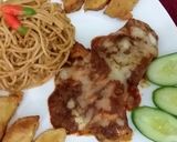 A picture of step 14 of Cheesy Chicken with spaghetti & potato wedges.