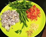 A picture of step 2 of Squid cubes and beans stir fry in kerala spicy-roast coating.