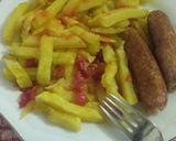 A picture of step 6 of French fries with sausage.