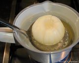 A picture of step 12 of Deep fried blooming onion.