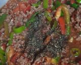 A picture of step 7 of Qeema macroni.