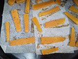 Habichuelas salteadas con chips de calabaza y huevo poche