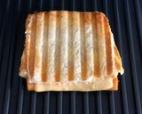 A picture of step 8 of Grilled Cheesy Chicken Sausage Egg Omelette Sandwich.