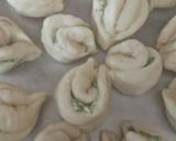 A picture of step 12 of Spinach garlic flower bread.