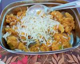 A picture of step 4 of Cheesey Vegetable Rava upma.