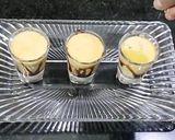 A picture of step 6 of Mango milkshake shots with chocolate syrup.