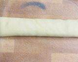A picture of step 3 of Cheesy garlicky puff wheel.