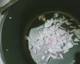 A picture of step 1 of Achari masoor pulao.