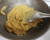 A picture of step 2 of Besan laddo with gud powder.