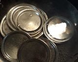 A picture of step 1 of Preserved Plums.