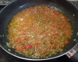 Foto del paso 5 de la receta: Lomos de Bacalao con tomate pimientos y almejas