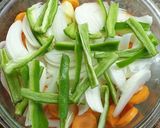 Foto del paso 6 de la receta: Muslos de pollo con patatas y verduras al horno