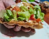 A picture of step 10 of Taco bell special Beans Chalupa.