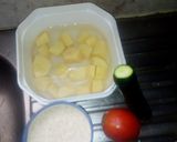 A picture of step 1 of Mchele mwitu u'r quick Kenyan meal.