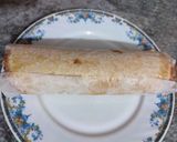 A picture of step 6 of Peach Swiss roll Ice cream Cake.