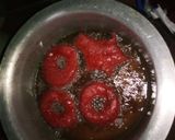 A picture of step 5 of Fried red velvet donuts.