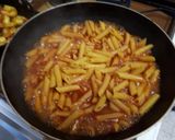 Une image de l'étape 5 de Pennes aux légumes et crevettes sautées à l'ail.