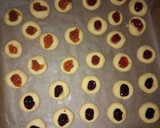 A picture of step 6 of Jam Thumbprint cookies.