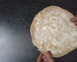 A picture of step 4 of Sandwich pizza from leftover Roti.