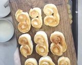 Foto del paso 5 de la receta: Palmeritas caseras con tapas de empanadas!