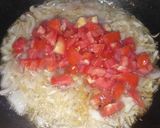 A picture of step 2 of Khageena (Spicy scrambled eggs).