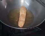 A picture of step 29 of Sugar coat khaja.