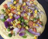 A picture of step 4 of Moongdaal pizza with peas.