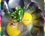 A picture of step 3 of Spicy Egg With Roti.