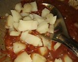 A picture of step 10 of Assamese bilahi boror tenga (Sour Curry with Red Lentil Fritter).
