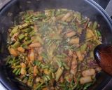 Foto del paso 2 de la receta: Arroz salteado con trigueros y ajetes